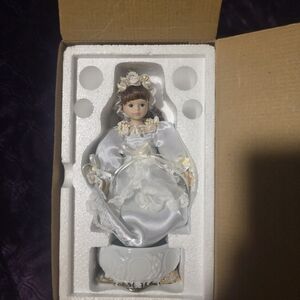 Charming Porcelain Doll in White Satin Dress